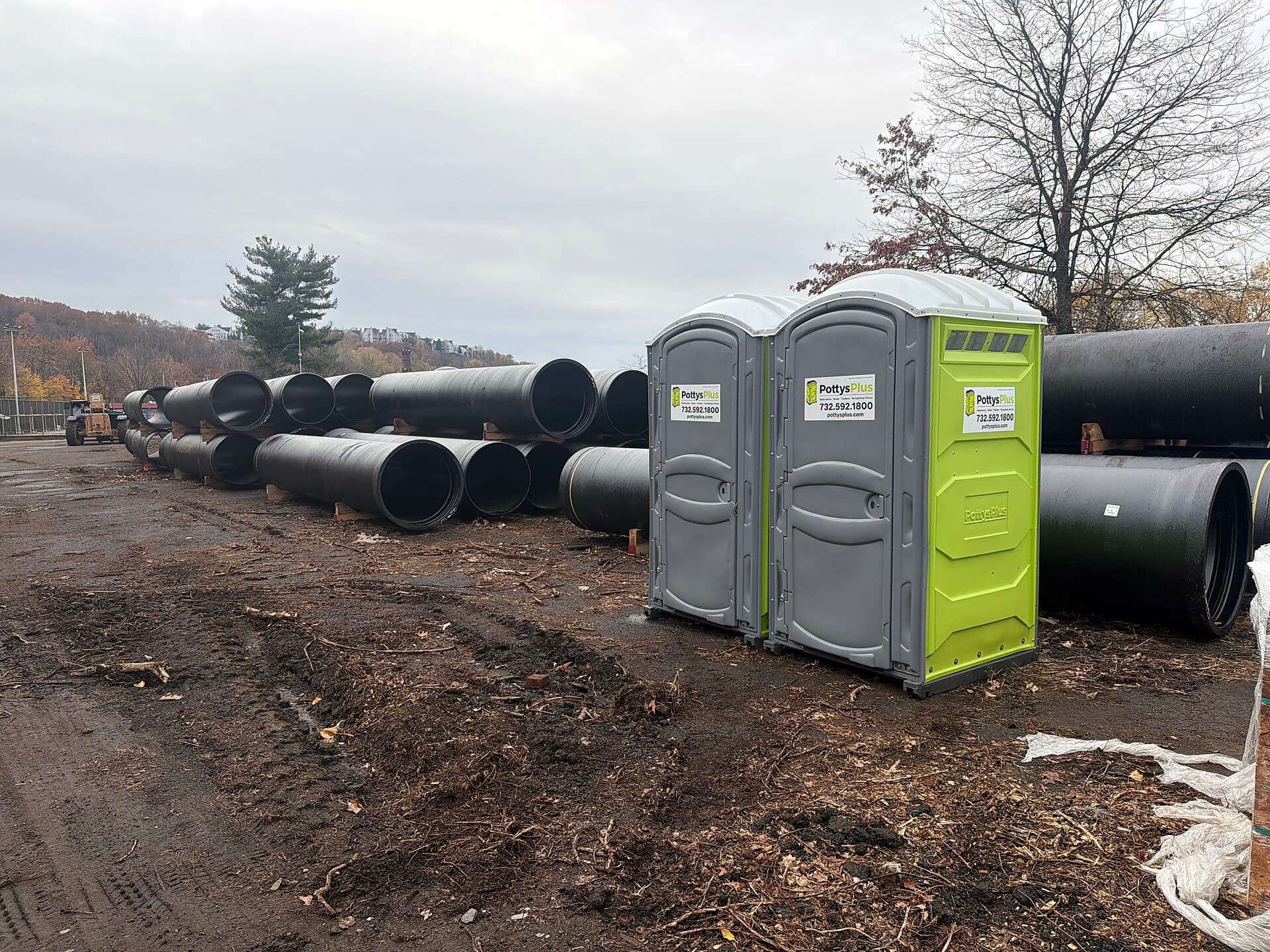 Real portable toilets staged at a construction site